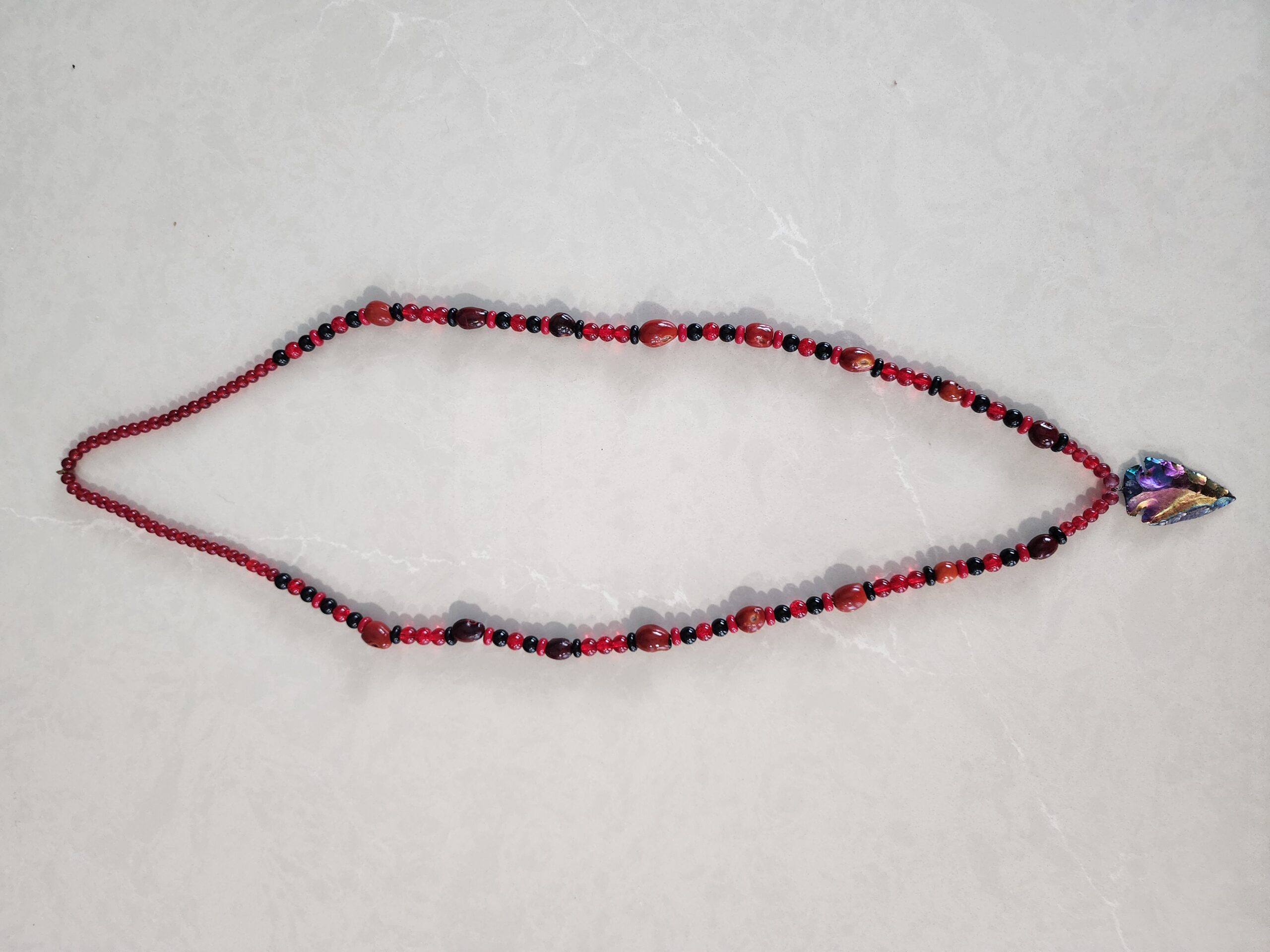 Red and Black Necklace with Iridescent Arrowhead Pendent - Image 2